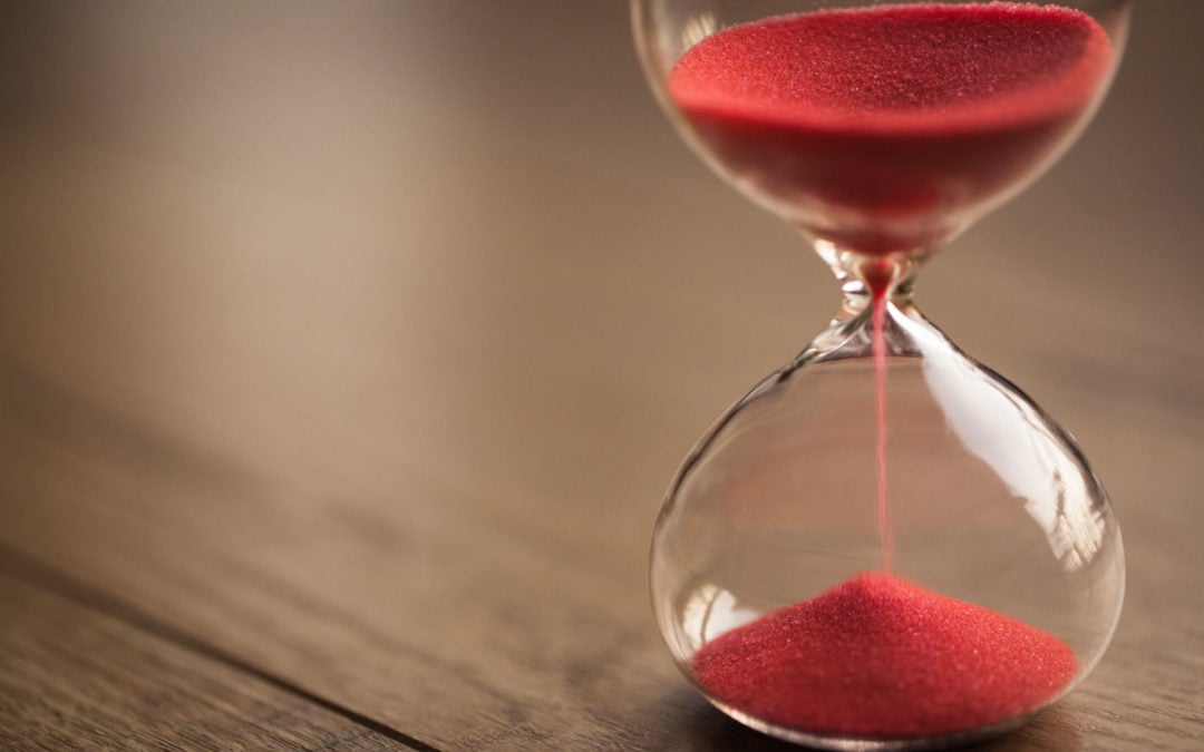 Hourglass on table