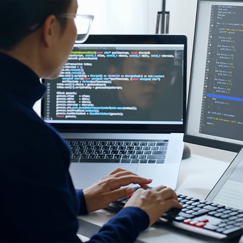 Developer writing code