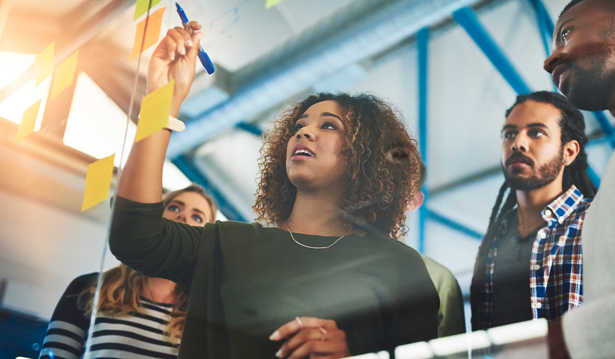 Business woman leading team in planning